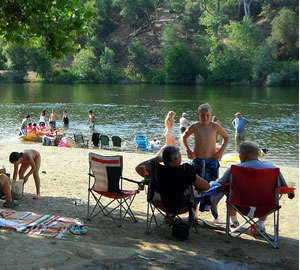 swim in the american river while attending the american river music festival, coloma, california